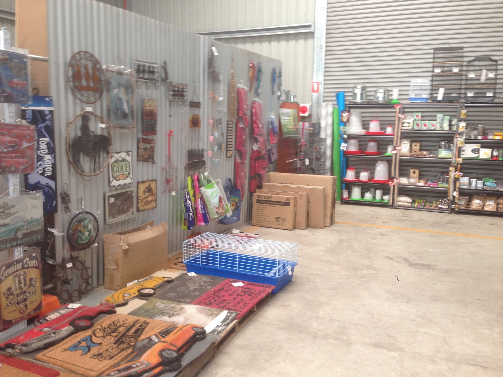 Inside the shed: the giftware wall, hutches, poultry feeders and shelving